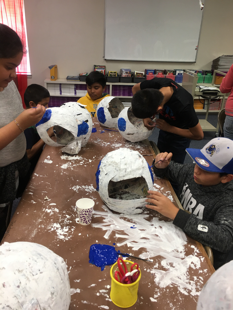 Grade 4 and 5 Students Making Space Helmets