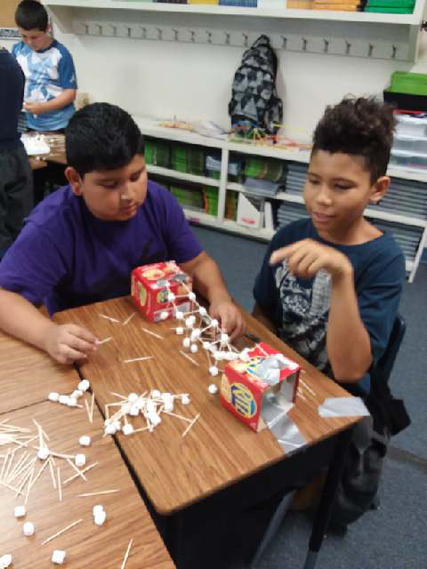 Grade 3 and 4 Students Building and Designing Bridges